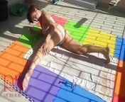An attractive lady is sunbathing on the roof of her house. Nude yoga Tans 2 from sib mouse nude 2