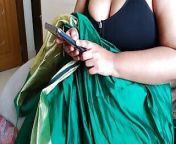 Telugu aunty in green saree with Huge Boobs on bed and fucks neighbor while watching porn on mobile - Huge cumshot from indian in green saree dress fuck