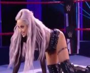WWE - Liv Morgan posing between the ring ropes from wwe women liv