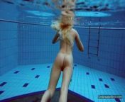 Sexiest brunette teen Milana Voda swimming in pool from meyeder voda