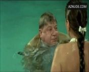 S. Grandi in white panties swimming with a guy in a 1987 movie from 1987 vintage beach erotic movies