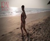 Nice lady at lonely nudist beach. Red swimsuit. Red bikini. from karkin kaftelhi lady sriram co